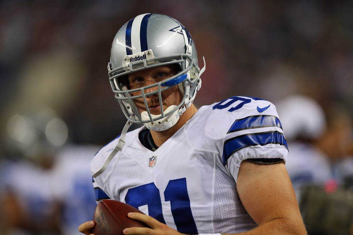 Dallas Cowboys long snapper L.P. LaDouceur (91) and quarterback