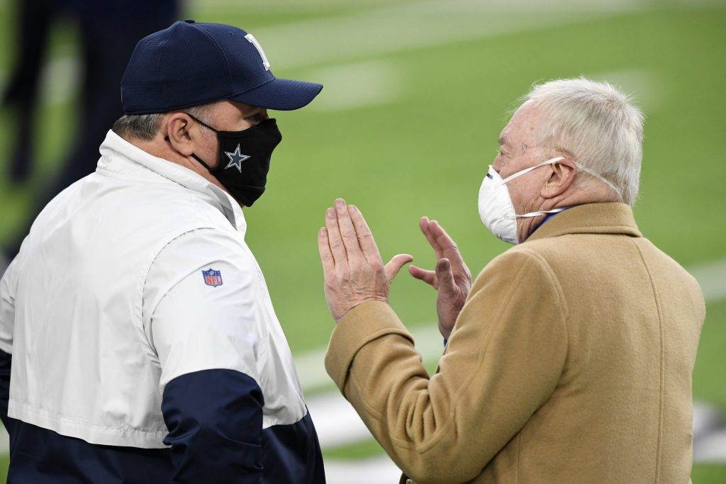 Jerry Jones and  Mike McCarthy