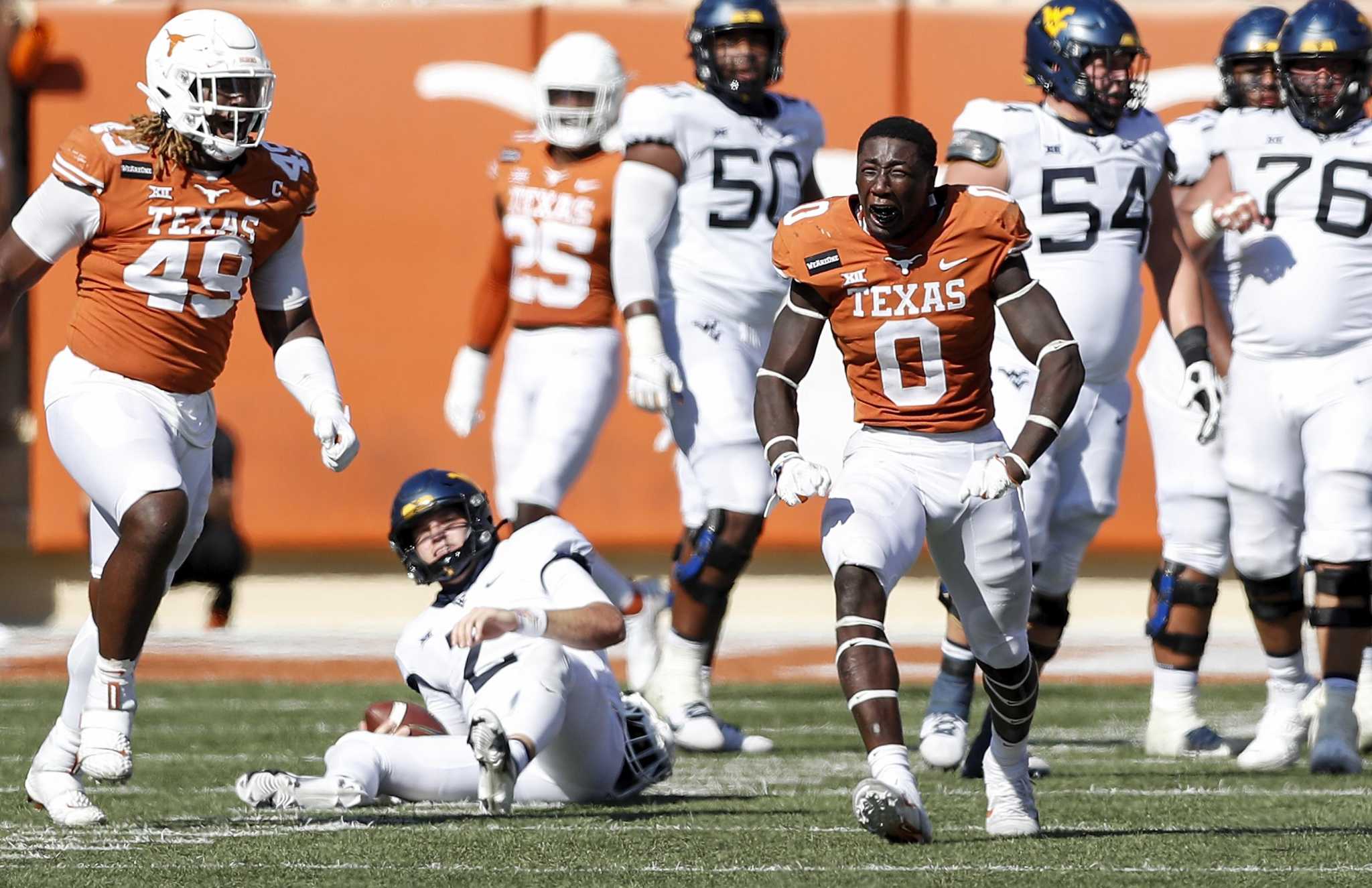 Cowboys stay home in third round, select Longhorns' Overshown