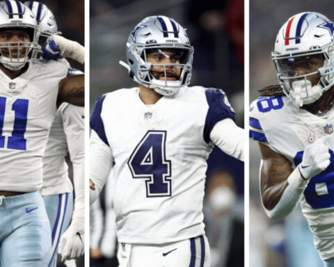 Who takes home midseason awards for the Dallas Cowboys?