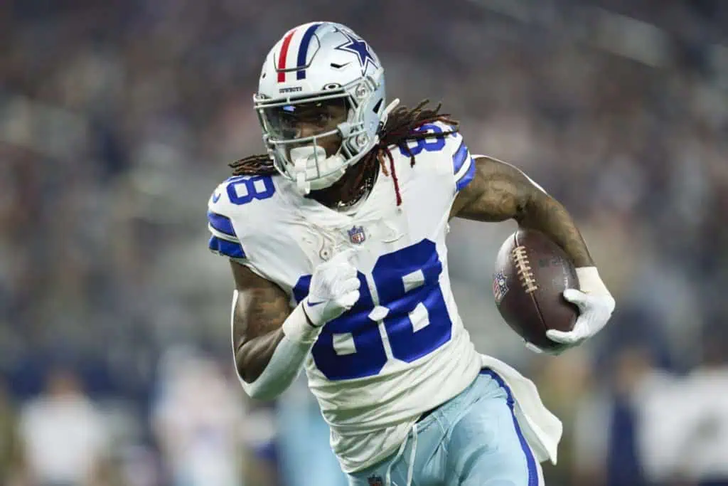 CeeDee Lamb celebrates in a Dallas Cowboys uniform after helping the Cowboys WR duo quietly finish among the NFL’s best.