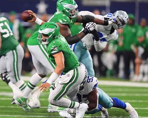 Eagles quarterback Jalen Hurts is sacked by Cowboys DT Osa Odighizuwa