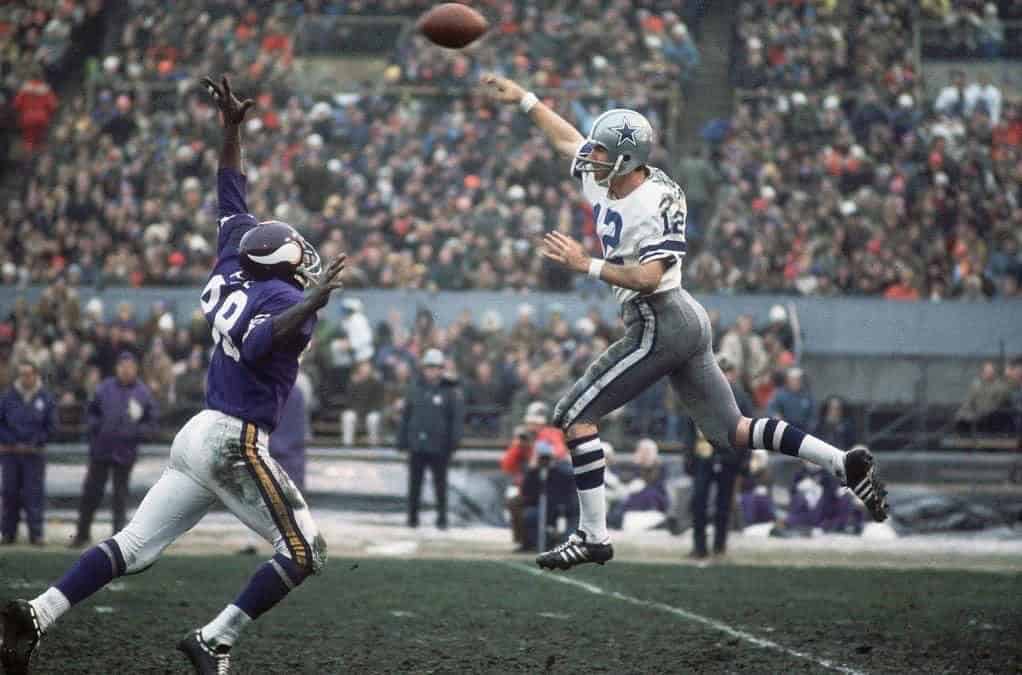 Roger Staubach leaps to complete a pass in a Christmas Day 1971 Divisional ROund playoff win over Minnesota.