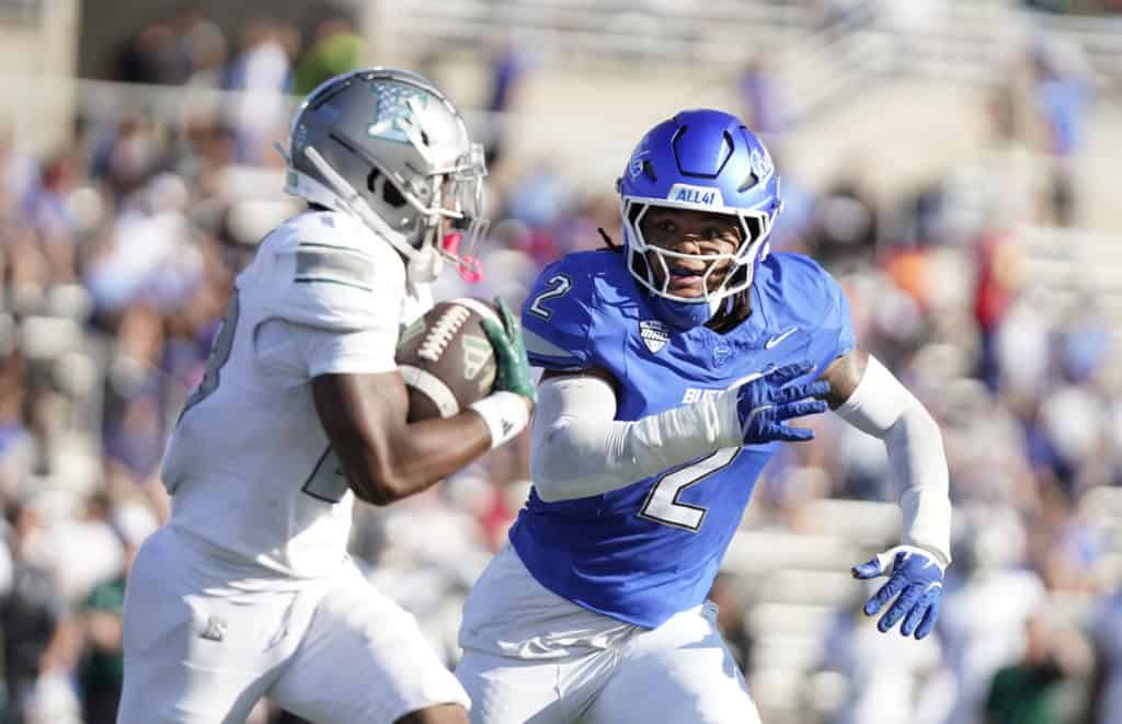 University at Buffalo linebacker Red Murdock (2) chases down Eastern Michigan runnign back Tavierre Dunlap (8) during a college football game at UB Stadium.