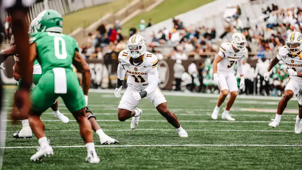Western Michigan Broncos defensive player closes in on the ball carrier during a game, included in a Mock Draft look at Group of Five defensive prospects.