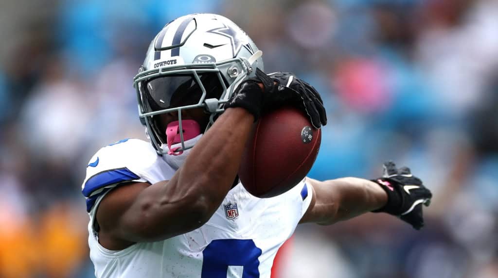 George Pickens making a one-handed catch during a Dallas Cowboys game amid George Pickens contract discussions.