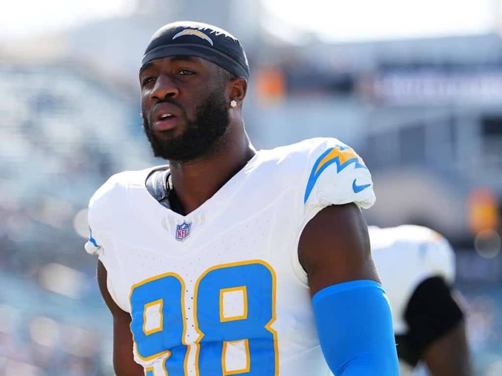 Odafe Oweh defensive end warming up before an NFL game as the  pass rusher for the LA Chargers prepares for the snap.