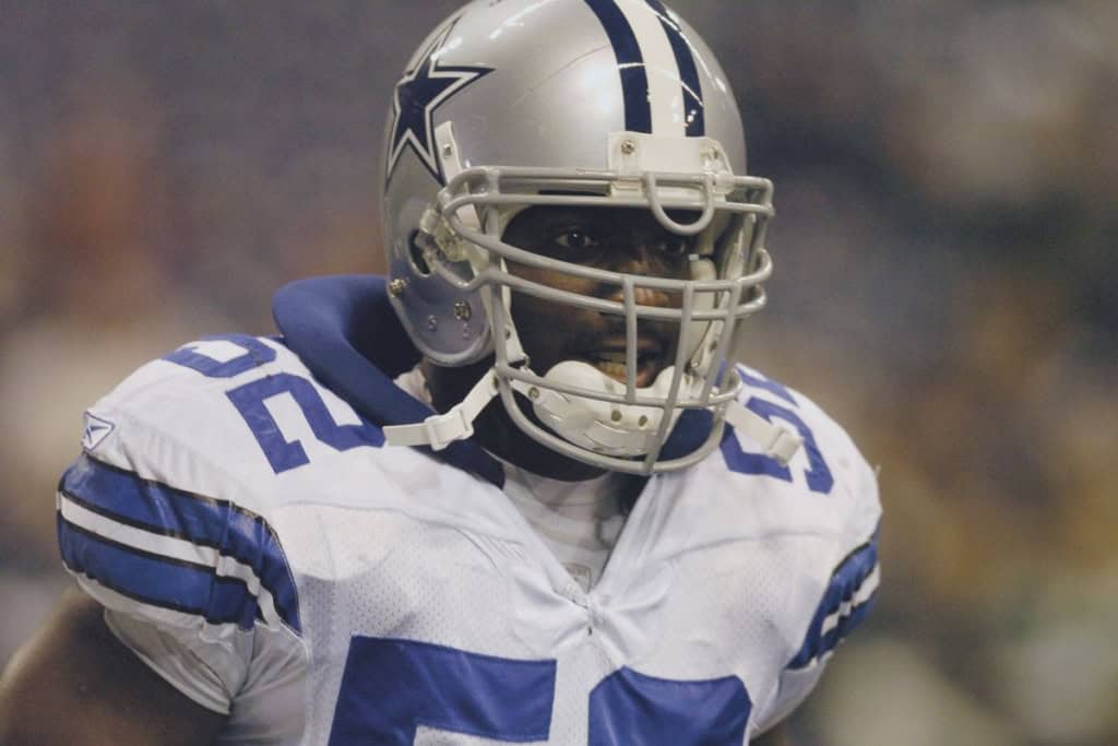 Former Dallas Cowboys linebacker Dexter Coakley in a white road uniform, showing the compact build and quick-play style often used in linebacker comparisons.