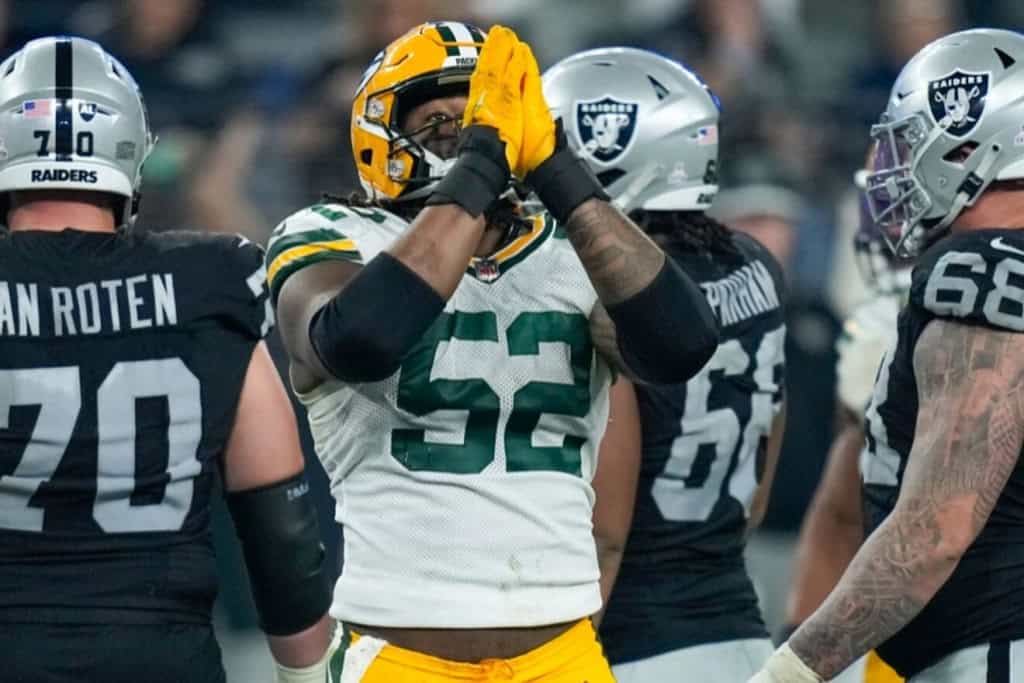 Rashan Gary praying celebration during Packers game in article explaining why the Rashan Gary and Kenny Clark trade combined is a win for the Cowboys