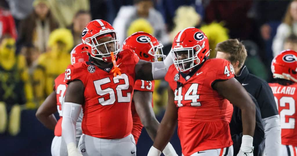 Georgia Defensive Prospects the Cowboys Could Target in the 2026 Draft Georgia defensive linemen Jordan Hall (#44) and Christen Miller (#52) celebrate a defensive stop for the Bulldogs defense, 2026 NFL Draft prospects.