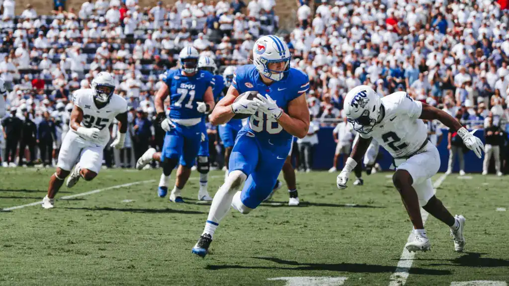 SMU tight end, Matthew Hibner (#88),running after the catch during an SMU Mustangs football game