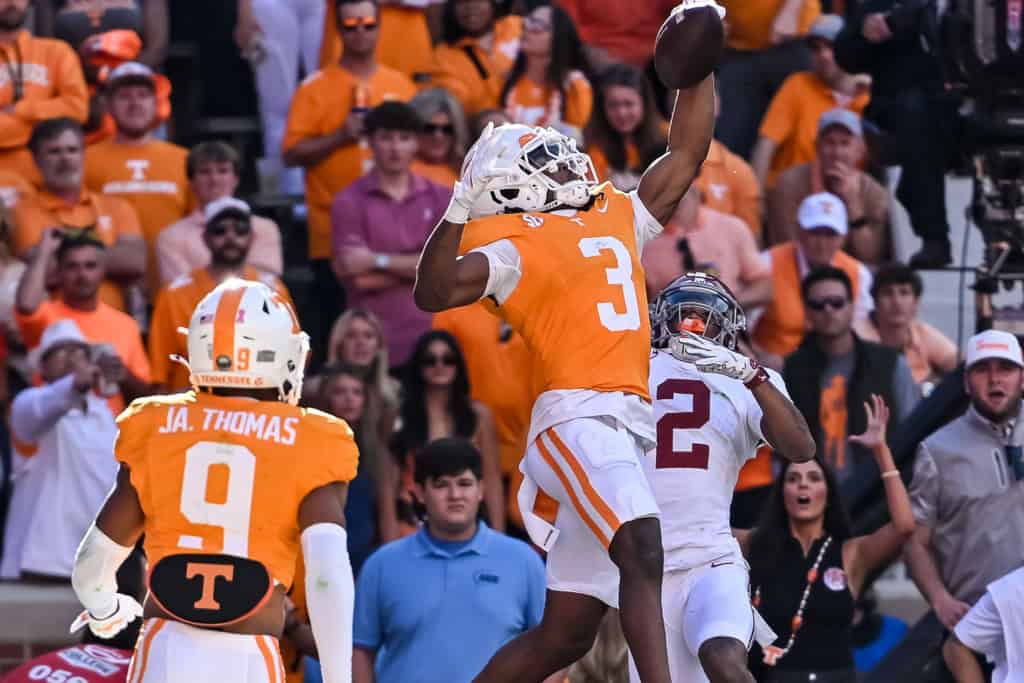 Jermod McCoy, wearing No. 3 for Tennessee, makes a play on the ball against Alabama during an SEC game.
