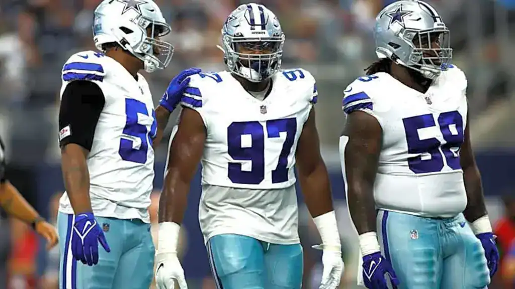 Dallas Cowboys defensive tackle Osa Odighizuwa celebrating with teammates before being traded for a 3rd-round pick