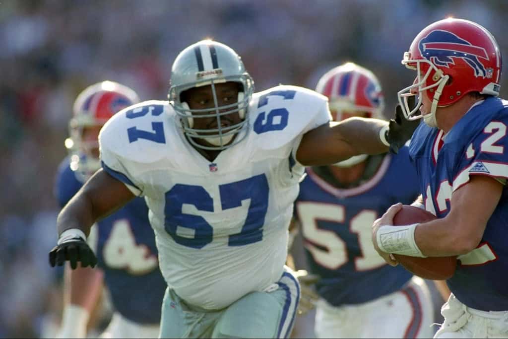 Dallas Cowboys first-round pick Russell Maryland rushing the quarterback against the Buffalo Bills