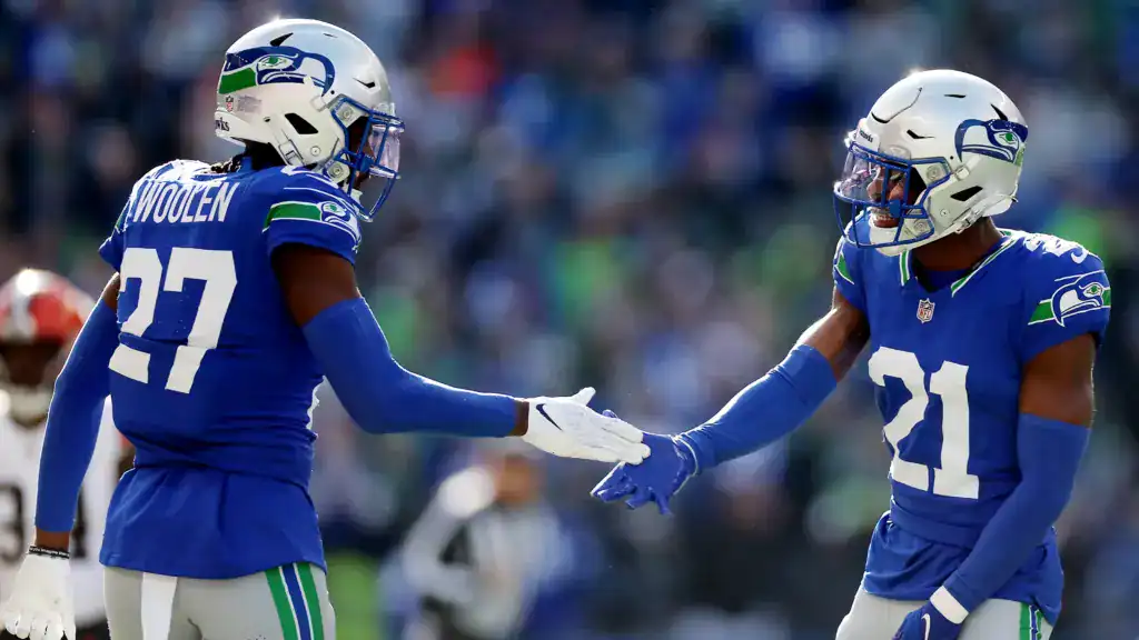 Seattle Seahawks defensive backs celebrate a play in a matchup connected to Dak Prescott and bad defenses