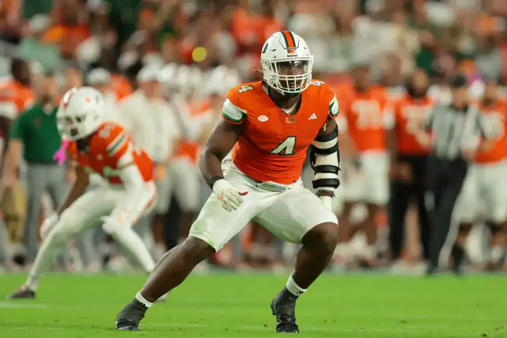 Miami defensive lineman Rueben Bain Jr. lines up before the snap, a powerful edge presence rising on NFL Draft boards.