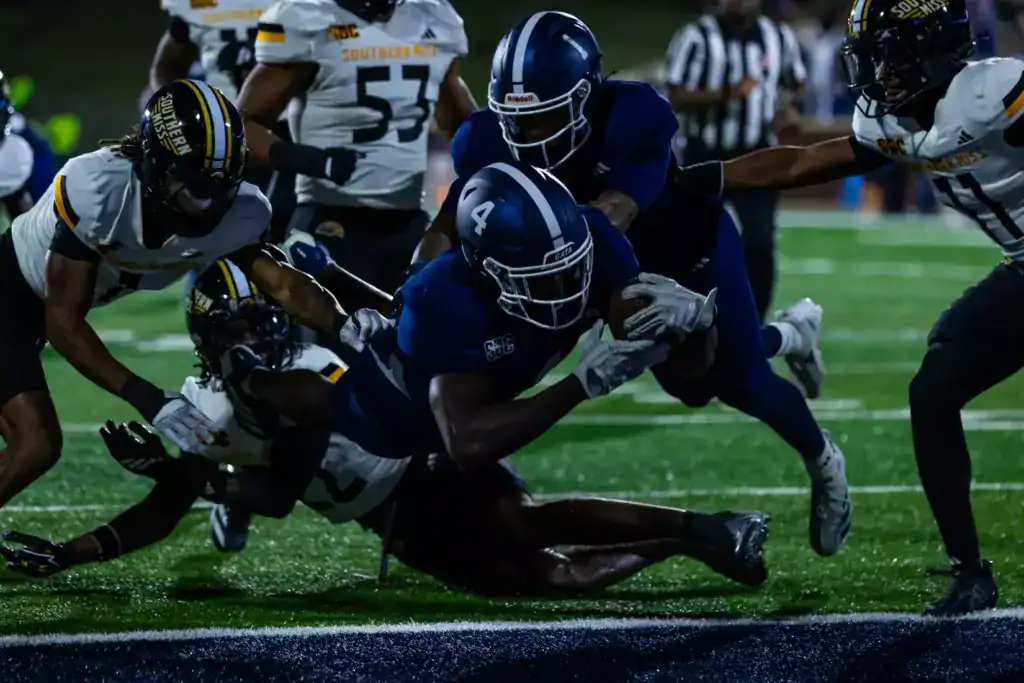 Georgia Southern wide receiver Camden Brown dives toward the end zone stretching the ball across the goal line, one of the Dallas Cowboys’ undrafted free agent signings.