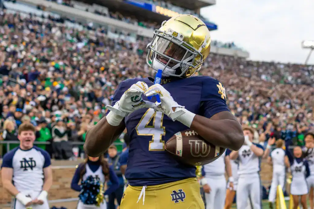 Notre Dame running back Jeremiyah Love celebrates in the end zone, continuing to build his case as one of the most exciting players in the NFL Draft class.