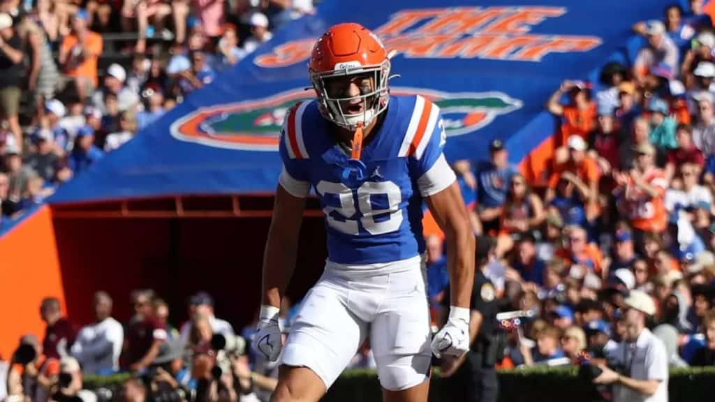Dallas Cowboys Mock Draft target Florida defensive back celebrates on the field before a home crowd