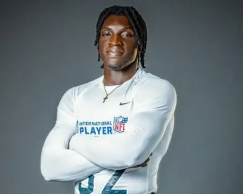 NFL International Player Pathway prospect poses in training gear during a studio portrait for the NFL’s global development program.