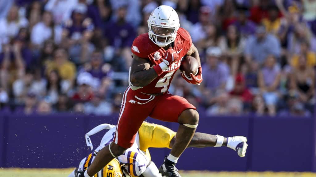 2026 NFL Draft prospect Mike Washington Jr. runs with the ball for Arkansas during a game against LSU.