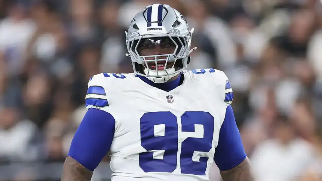 Quinnen Williams shown in a Dallas Cowboys uniform as an interior defensive line piece in the 2026 defensive depth chart projection.