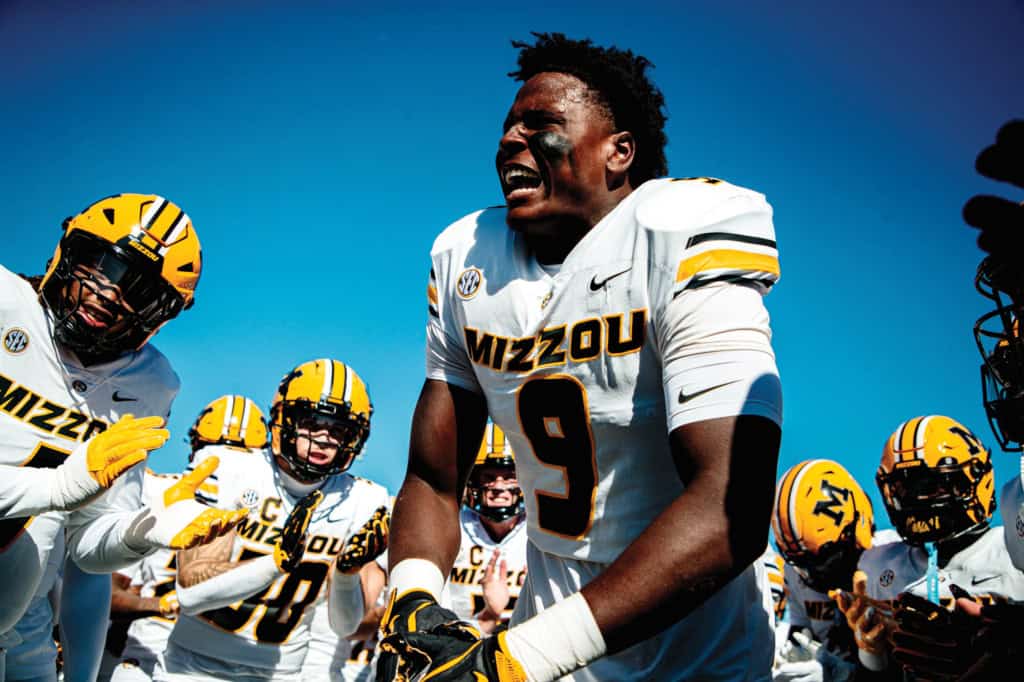 2026 NFL Draft prospect Zion Young fires up teammates while wearing Missouri’s white uniform.