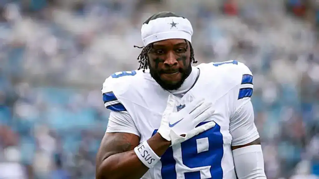 Ryan Flournoy warms up in a white Dallas Cowboys uniform for Dallas Cowboys Breakout Watch 2026.