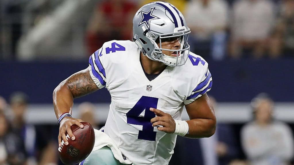 Dak Prescott Gives Cowboys the Edge Over Most at Quarterback in 2026 Dak Prescott scrambles with the football as the Dallas Cowboys quarterback looks to lead the team in 2026