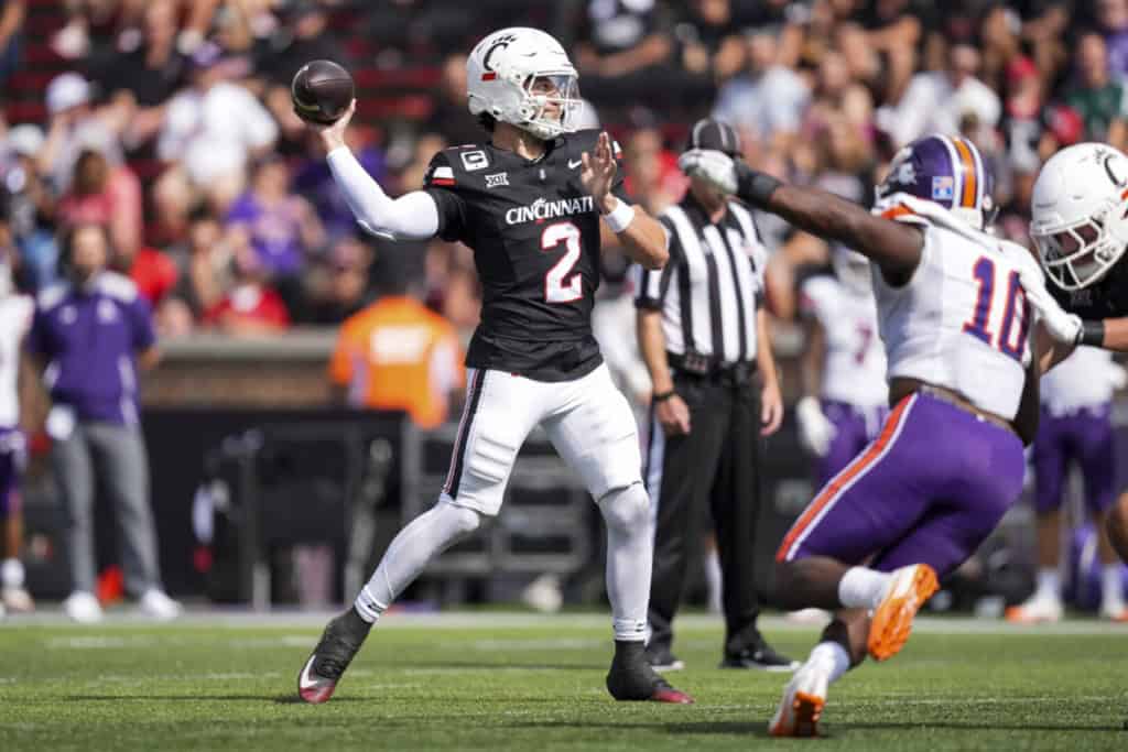 Brendan Sorsby to the Cowboys through the 2027 Supplemental Draft? Brendan Sorsby throwing a pass for Cincinnati while facing pressure from a Northwestern State defender