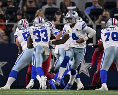 Dallas Cowboys quarterback Dak Prescott runs the offense behind Terence Steele and the offensive line, with Javonte Williams in the backfield, as the team looks to build toward a strong 2026 record prediction.