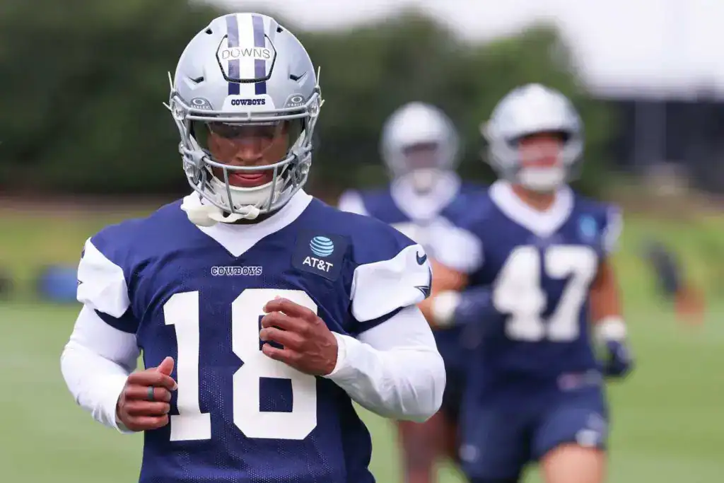 Dallas Cowboys rookie safety Caleb Downs runs during practice, representing the Cowboys defense.