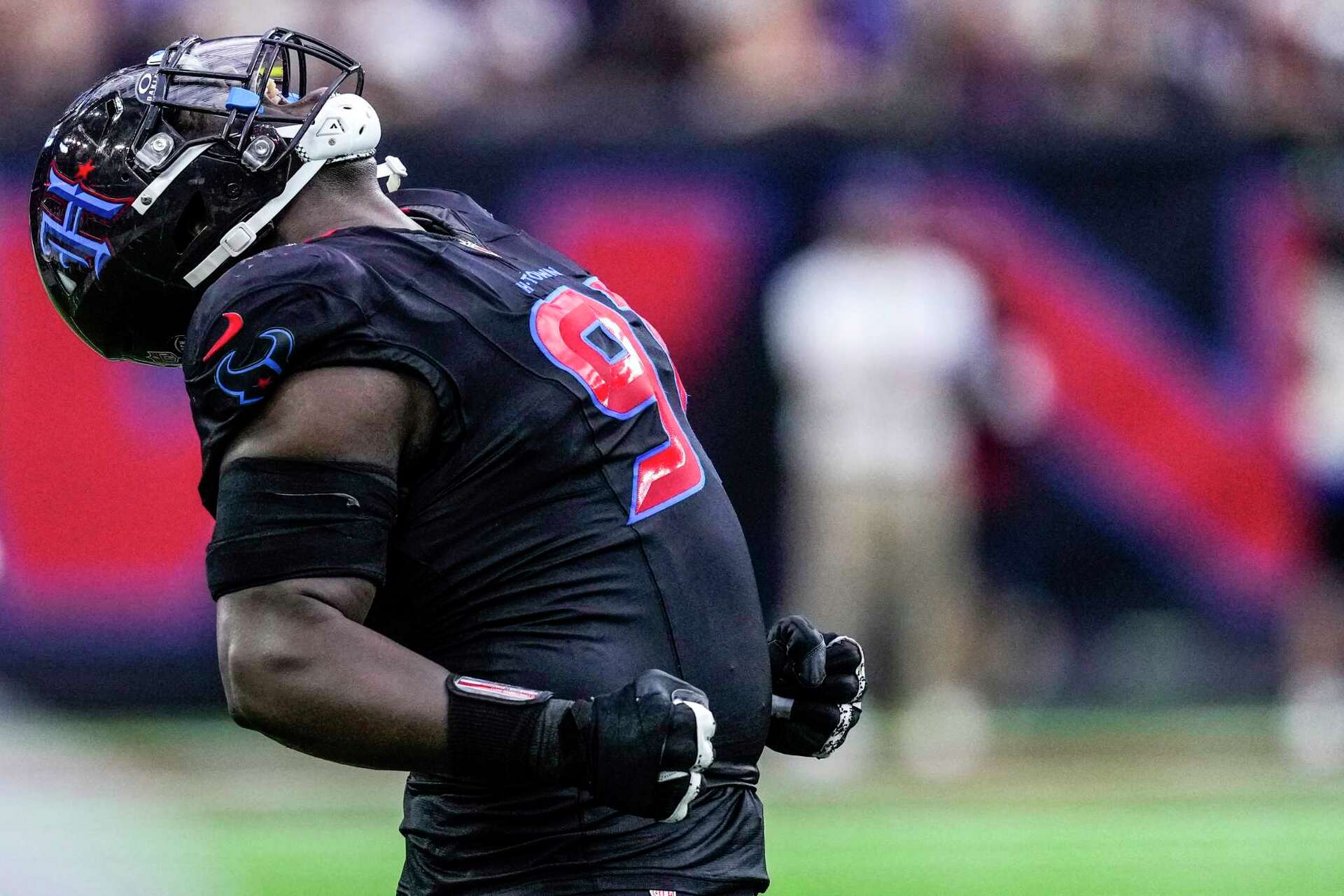 Veteran free agent defensive tackle Folorunso Fatukasi reacts after a play in a Houston Texans uniform.