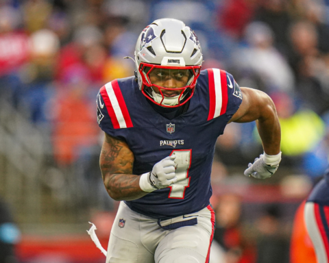 Antonio Gibson runs upfield during a New England Patriots game