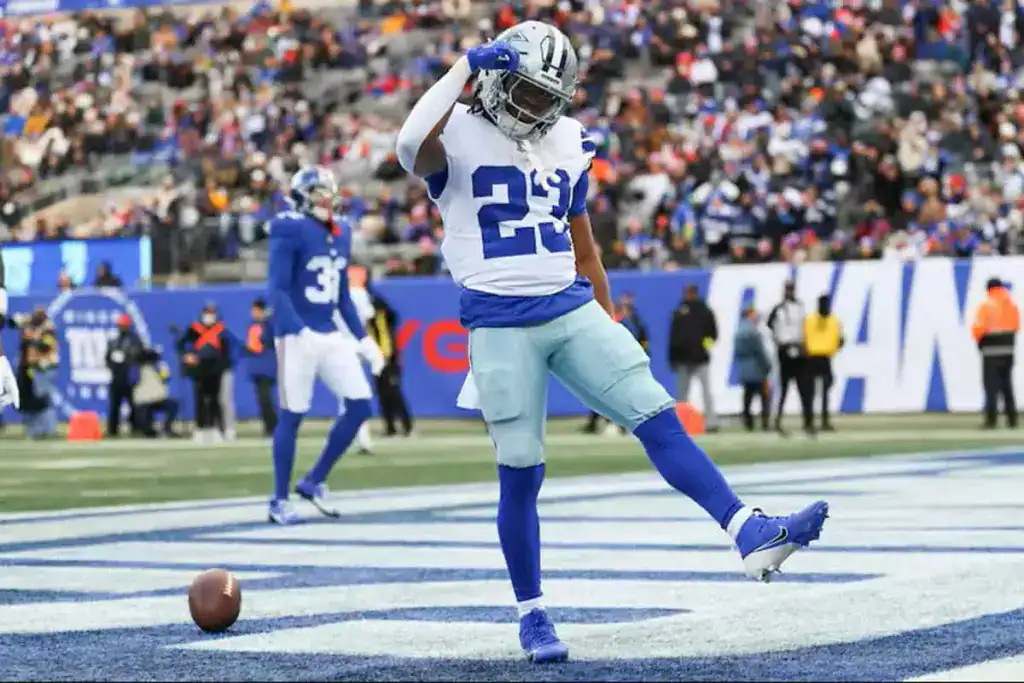 Jaydon Blue stands in the end zone after a touchdown as the Cowboys rookie pushes for the RB2 role.