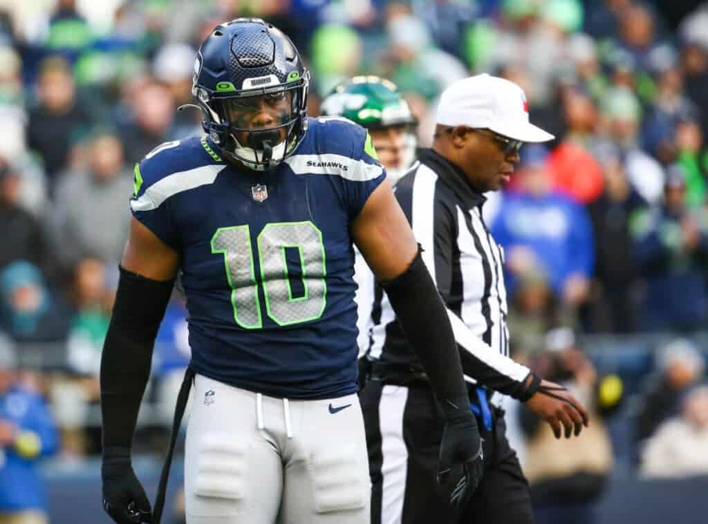 Uchenna Nwosu walks on the field for the Seattle Seahawks as a possible June 1st cut candidate.
