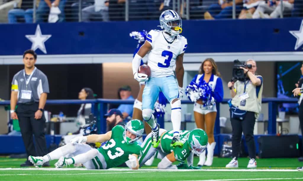 George Pickens celebrates with the Cowboys quarterback during a game, adding fuel to trade rumor buzz surrounding Dallas’ offense.
