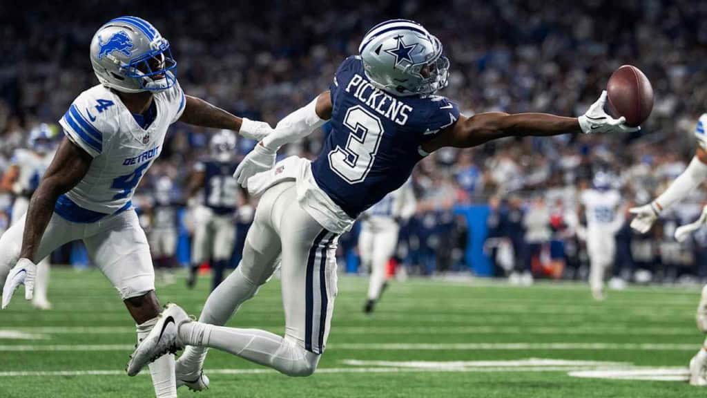 George Pickens stretches out for a one-handed catch against Detroit, highlighting why trade rumors around his impact in Dallas are gaining attention.