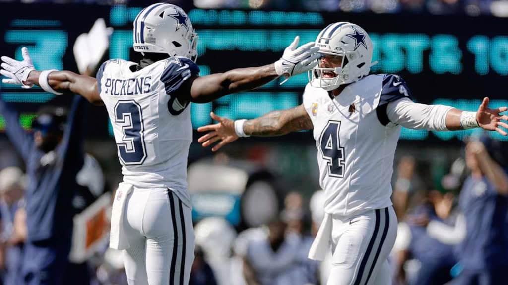 George Pickens celebrates with the Cowboys quarterback during a game, adding fuel to trade rumor buzz surrounding Dallas’ offense.