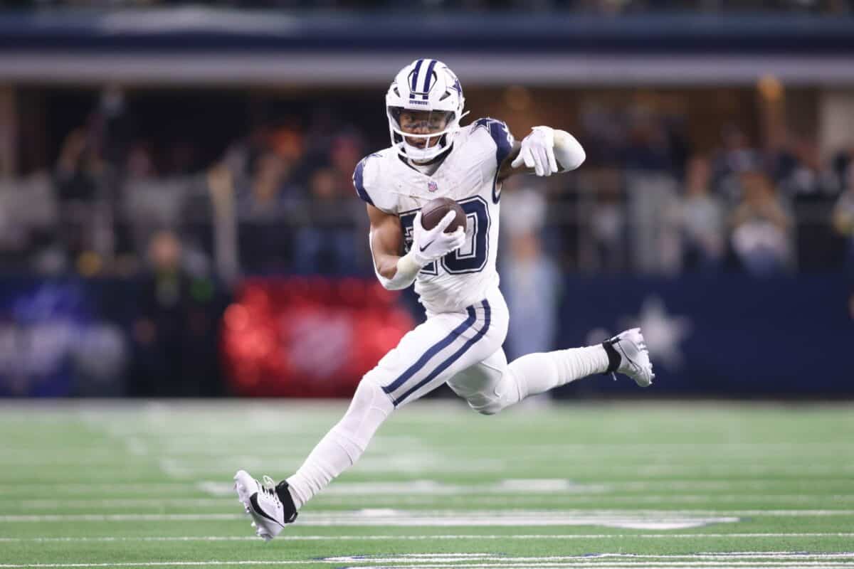 Tony Pollard looks for running room during a Dallas Cowboys game.