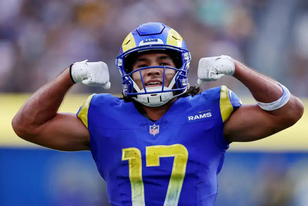 Puka Nacua flexes in a Los Angeles Rams uniform as part of the NFL wide receiver production comparison with the Cowboys WR duo.

