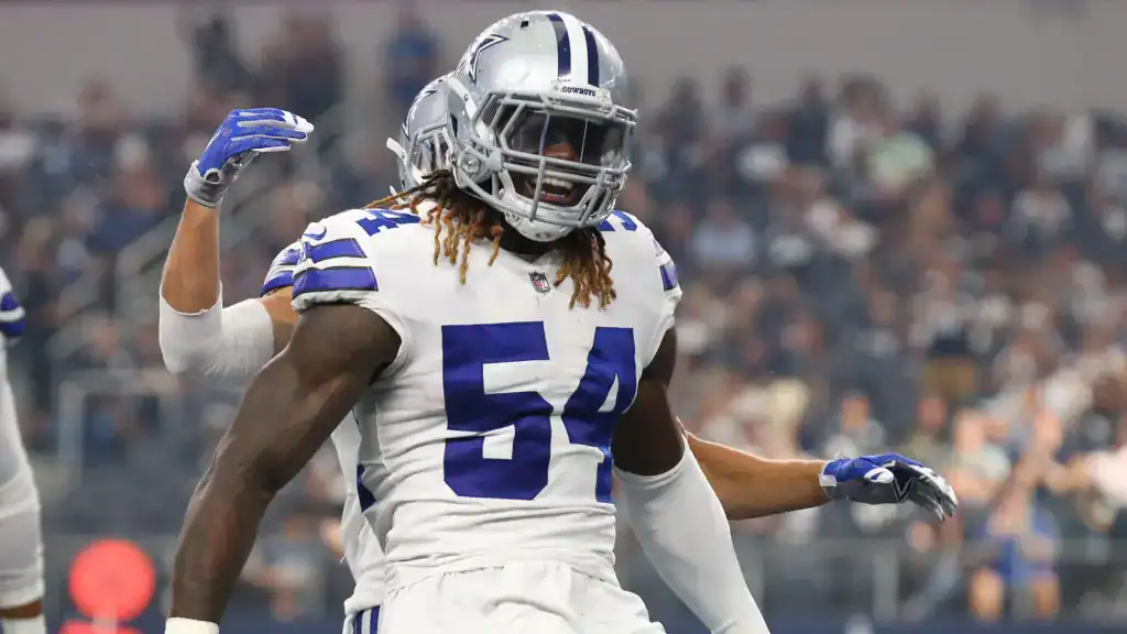 The Cowboys Aren't Cheap—Their Spending Problem Is Worse Jaylon Smith celebrates in a Cowboys uniform, showing how Dallas’ spending issues often come from rewarding risky internal contracts.