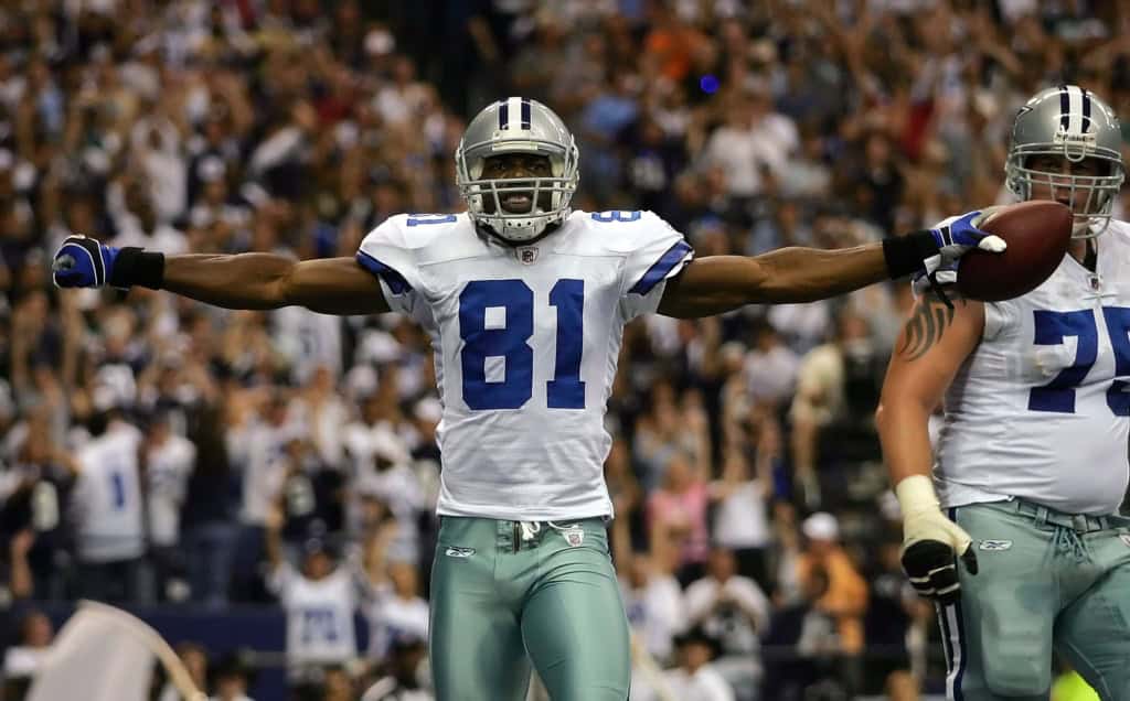 Terrell Owens celebrating with the football for the Dallas Cowboys, showing the star power PFF overlooked.