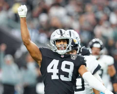 Charles Snowden celebrating on the field while playing for the Las Vegas Raiders.
