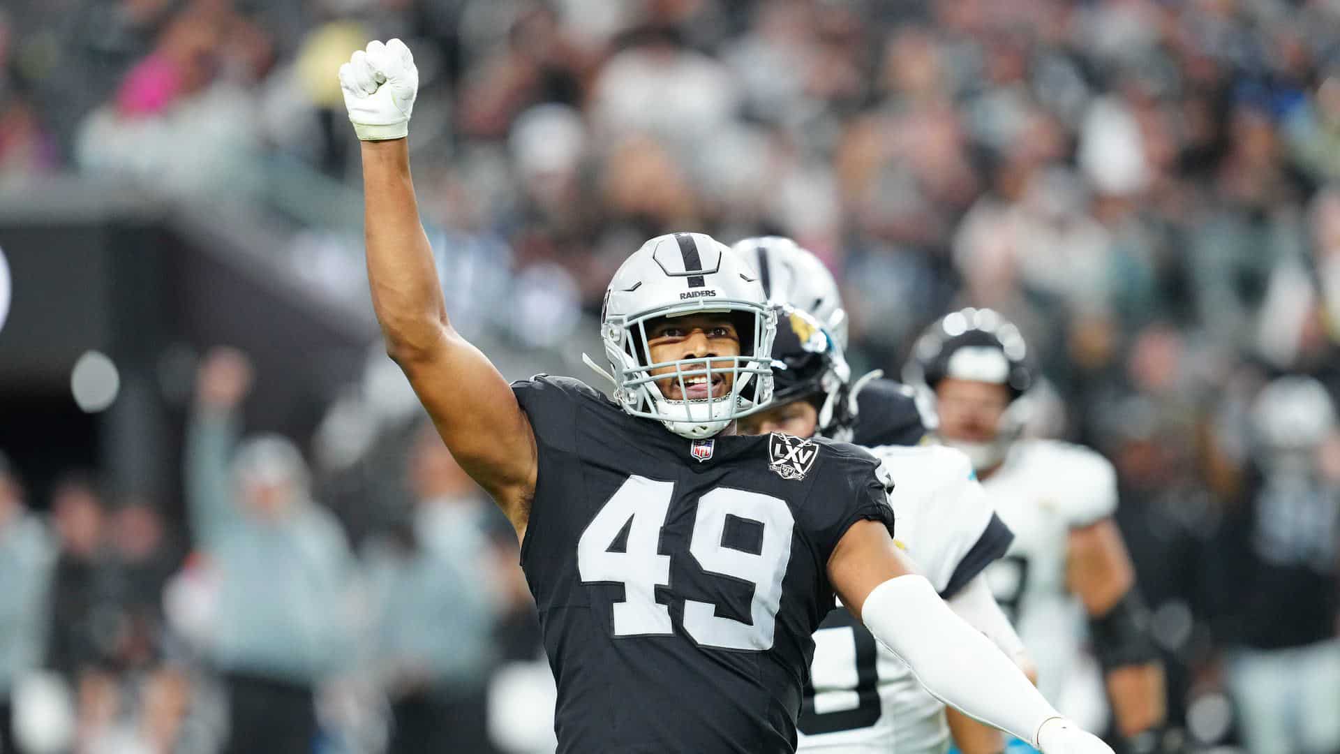 Charles Snowden celebrating on the field while playing for the Las Vegas Raiders.