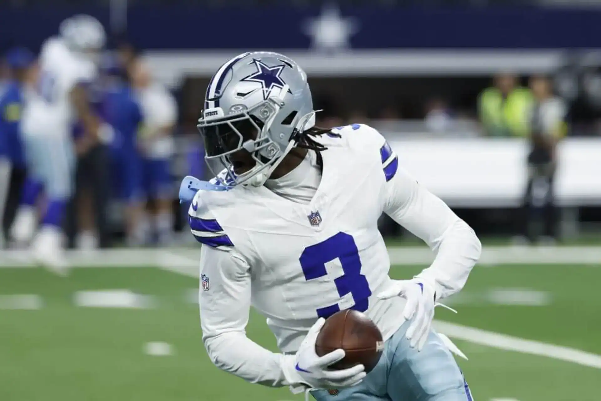 George Pickens runs with the football for the Dallas Cowboys as his market value climbs ahead of a major 2026 contract season.