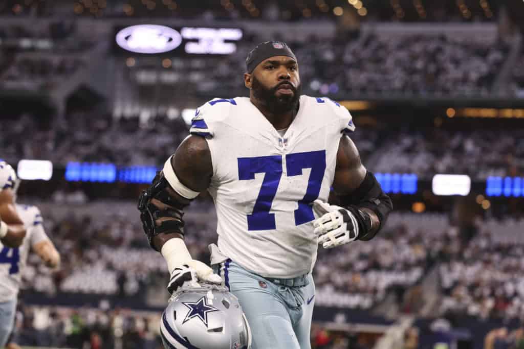 Tyron Smith carrying his helmet for the Dallas Cowboys, a future Canton case the Hall of Fame needs to handle correctly.