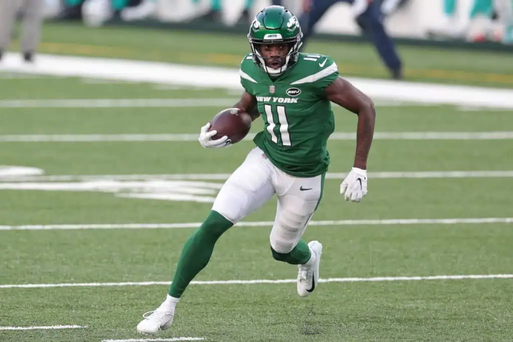 Denzel Mims carries the football before getting another NFL look with the Cowboys