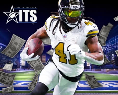Alvin Kamara carries the football for the Saints, highlighting the dual-threat skill set he could bring to the Cowboys backfield at the right number.