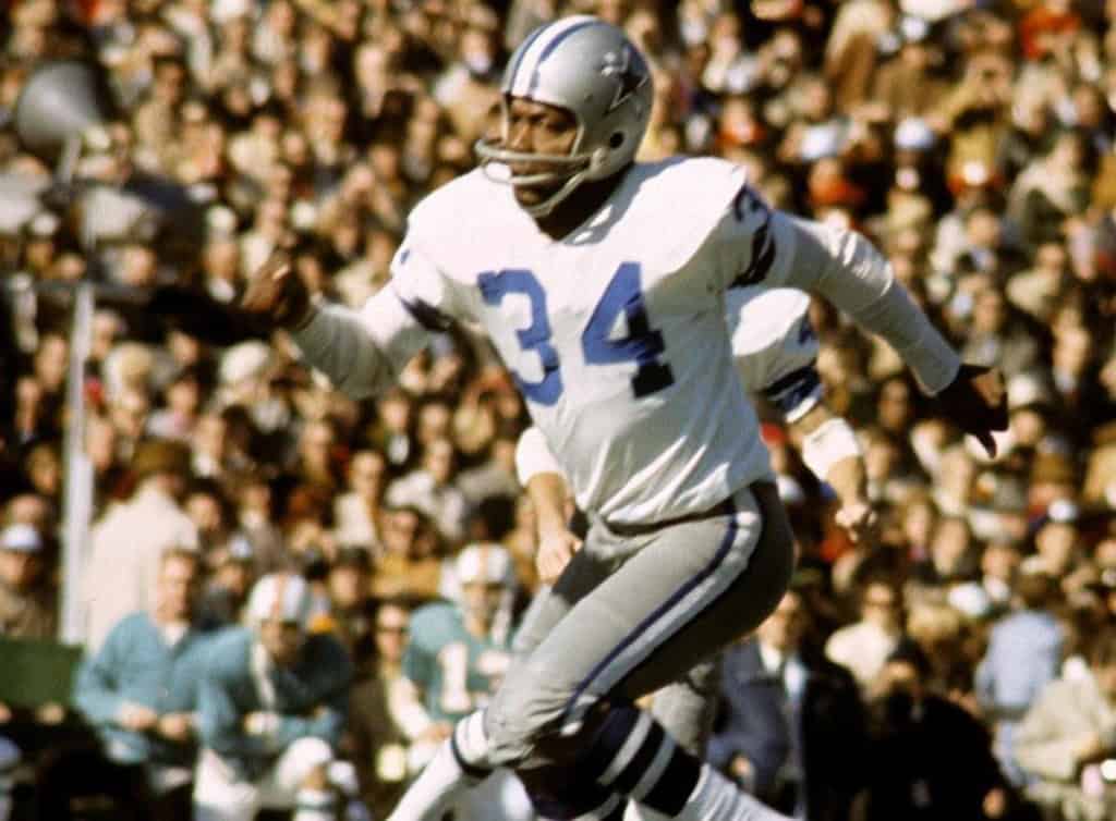10 Dallas Cowboys Hall of Fame Snubs Who Deserve Canton: Nos. 10-6 Cornell Green running in a Dallas Cowboys No. 34 uniform, one of Dallas’ defensive backs who deserves more Hall of Fame respect.